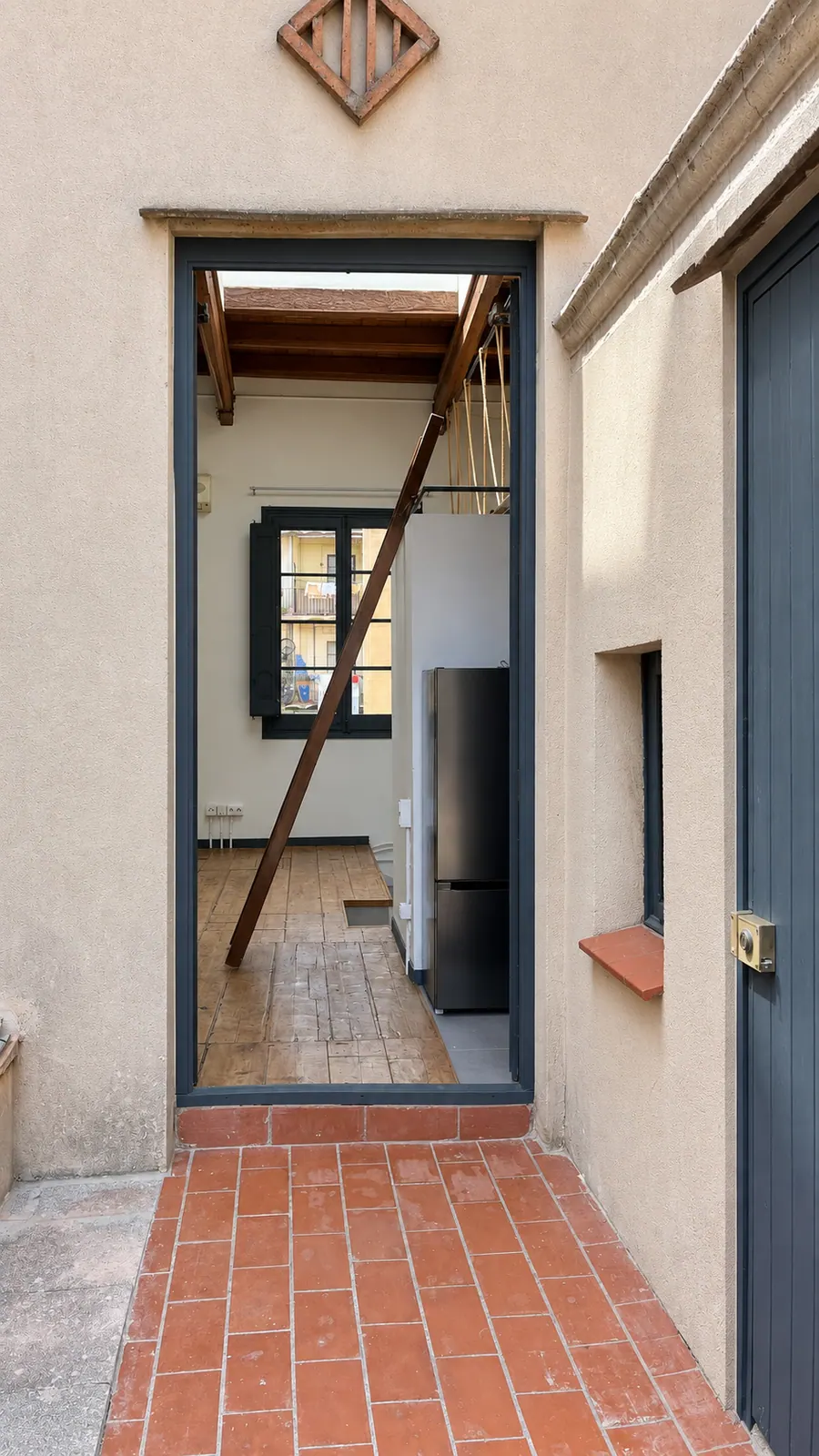 AiP third-floor terrace and doorway into the loft