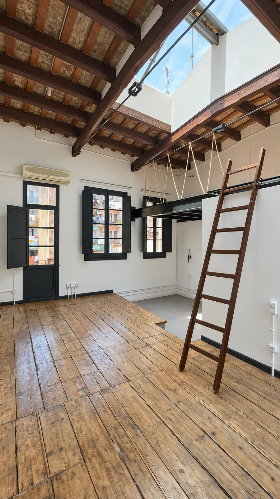 AiP third-floor open living area with skylight
